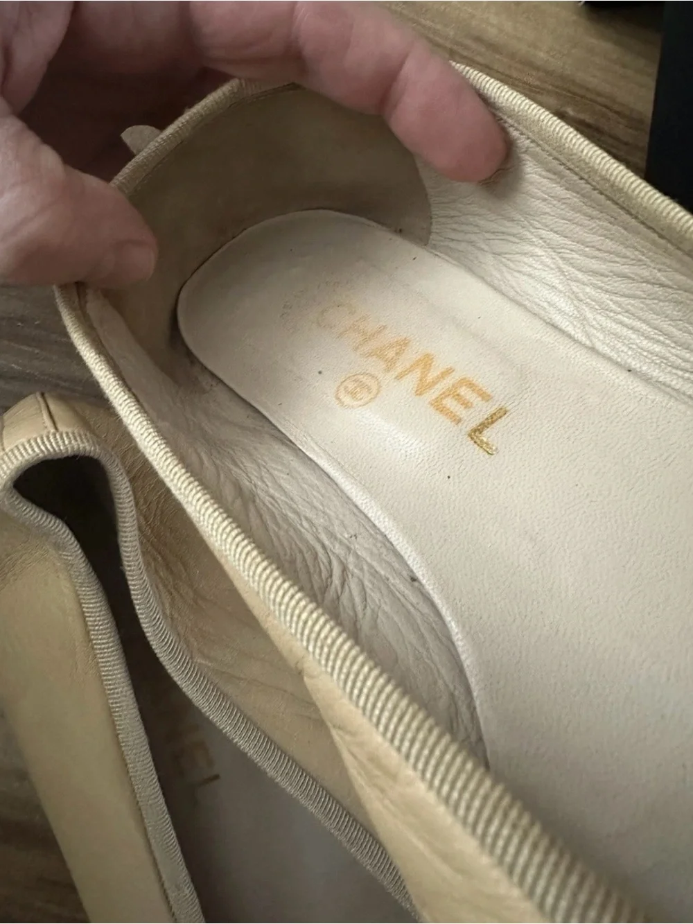 CHANEL Beige Leather Ballet Flats with Black Cap Toe